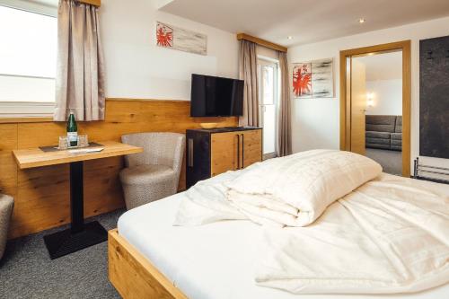 Hotel Das Köhle INKLUSIVE SUPER SOMMER CARD 2025にあるベッド
