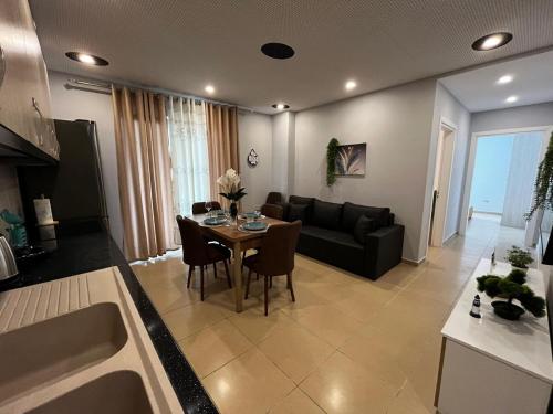 Χώρος καθιστικού στο Cattleya Apartment