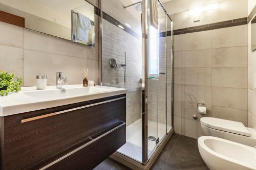 a bathroom with a sink and a shower at Il Rustico in Castel San Pietro