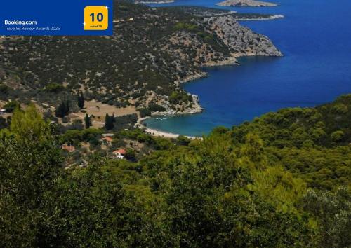 an aerial view of an island with a body of water at Private Beach House Irene Mare in Poros