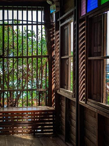 Μπαλκόνι ή βεράντα στο โรงแรมเฮือนช้างเผือก Huen Chang Phueak