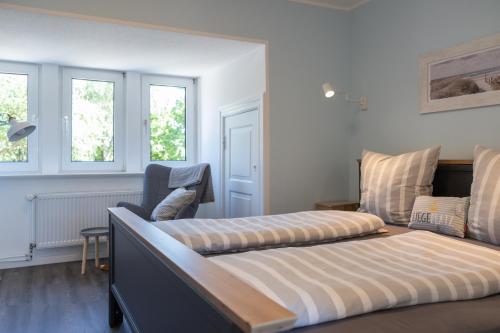 Ένα ή περισσότερα κρεβάτια σε δωμάτιο στο Lotsenhaus