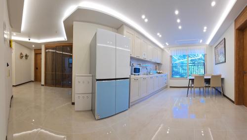 Kuchyň nebo kuchyňský kout v ubytování Incheon airport Guesthouse L
