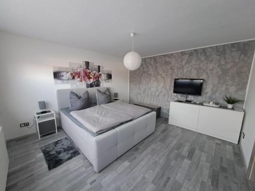 Postel nebo postele na pokoji v ubytování Ferienwohnung Schäfer am Nationalpark Kellerwald
