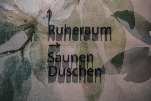 a painting of a flower with the words raingram summon summon summon summondriver at Metzgerwirt in Hippach