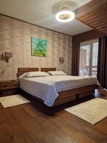 Postel nebo postele na pokoji v ubytování Pensiunea Terra Nova