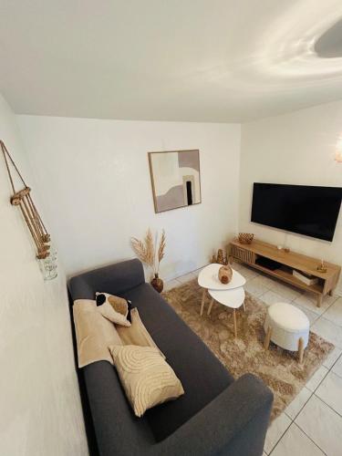 Гостиная зона в La pause Biardaise -Appartement 2 chambres à Biard