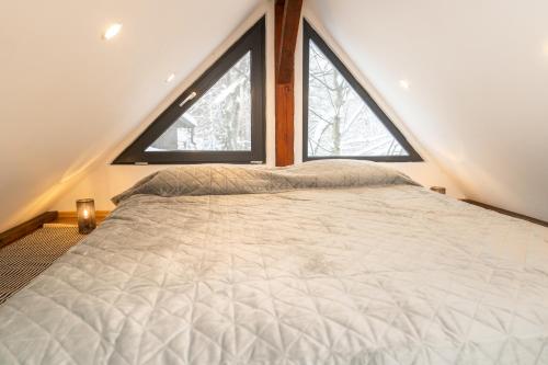 Ένα ή περισσότερα κρεβάτια σε δωμάτιο στο Leaf Loft Chalet