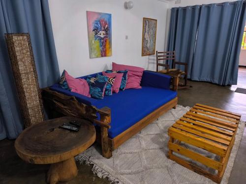 Postel nebo postele na pokoji v ubytování Serene Home