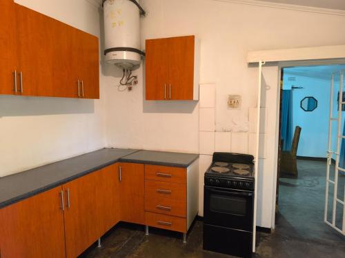 Kuchyň nebo kuchyňský kout v ubytování Serene Home