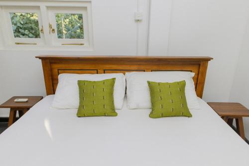 Ένα ή περισσότερα κρεβάτια σε δωμάτιο στο Phoenix house ahangama