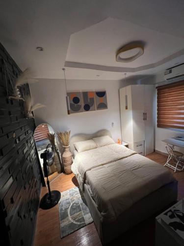 Postel nebo postele na pokoji v ubytování LOGA Apartment