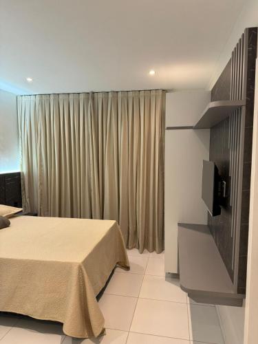 Ένα ή περισσότερα κρεβάτια σε δωμάτιο στο Flatsbg