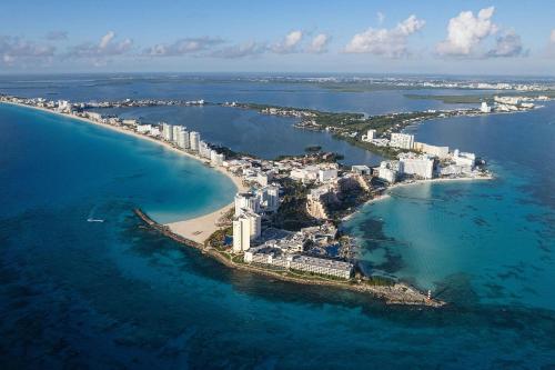 an aerial view of an island in the ocean at Aloft Cancun in Cancún