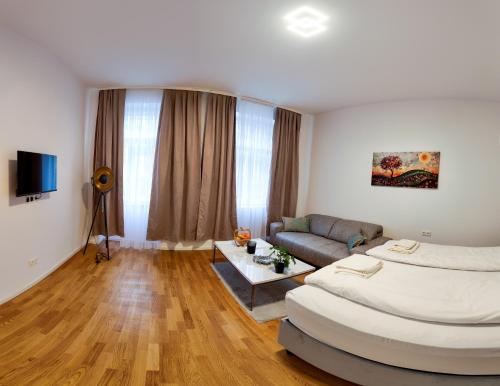 En eller flere senge i et værelse på Art Living Vienna