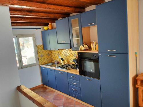Dapur atau dapur kecil di Attico sul Mare