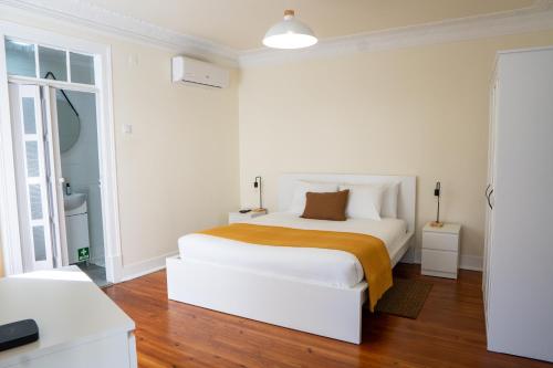 Katil atau katil-katil dalam bilik di Matching Loures Guest House