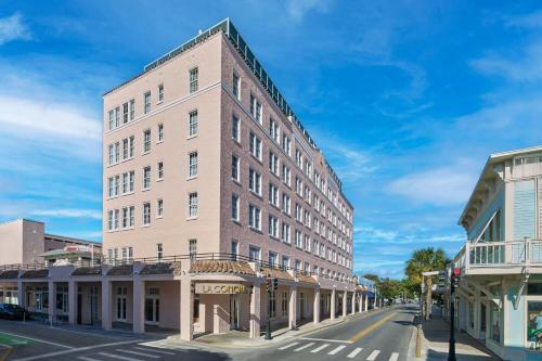 a tall brick building on a city street at La Concha Key West, Autograph Collection in Key West
