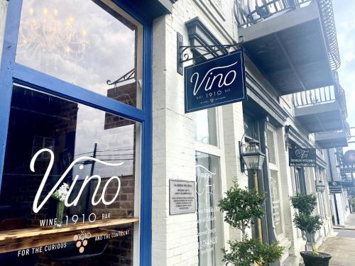 a sign in the window of a wine store at Eagle Exec Loft In Downtown Statesboro in Statesboro