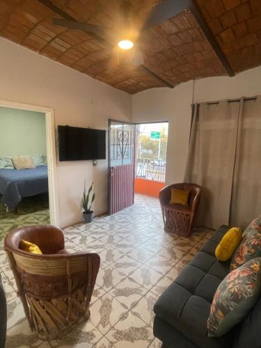 TV a/nebo společenská místnost v ubytování Departamento suite # 4