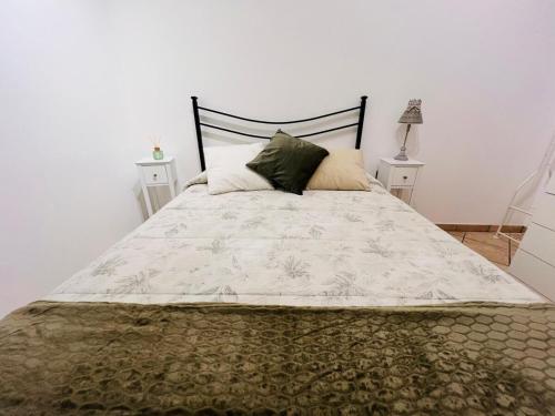 Ένα ή περισσότερα κρεβάτια σε δωμάτιο στο Suite Elsa - Sanremo