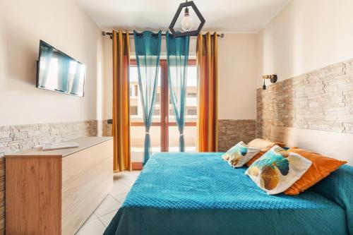 Postel nebo postele na pokoji v ubytování Giramondo Guest house