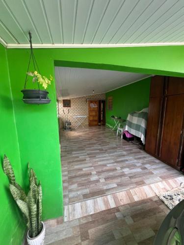 Postel nebo postele na pokoji v ubytování Casa agradável, próximo a Gramado