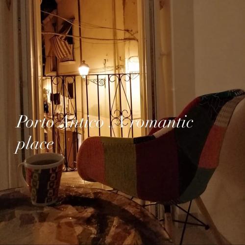 a chair sitting in front of a door at Porto Antico in Bari