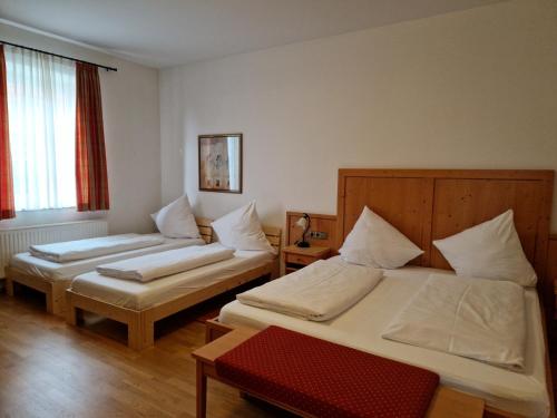 Postel nebo postele na pokoji v ubytování Landgasthof Krone