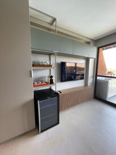Kuchyň nebo kuchyňský kout v ubytování Flat Eco Resort Praia Dos Carneiros