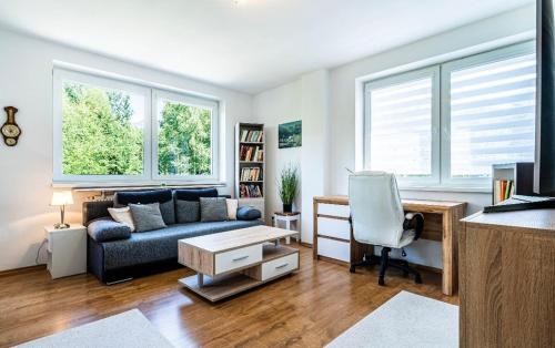Χώρος καθιστικού στο LuxTatras Apartment