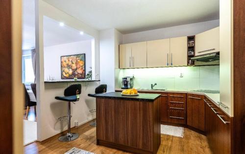 Η κουζίνα ή μικρή κουζίνα στο LuxTatras Apartment