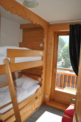 Cama o camas de una habitación en Oustalet