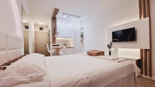 Ένα ή περισσότερα κρεβάτια σε δωμάτιο στο Amber Gloss, Casa Al Mare