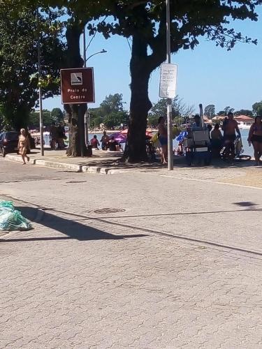 a street with a sign on the side of the road at Arbricot in Rio das Ostras