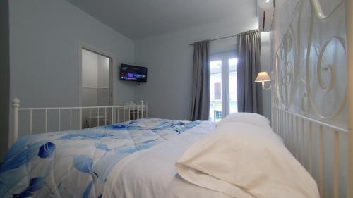 Ένα ή περισσότερα κρεβάτια σε δωμάτιο στο 65012 House
