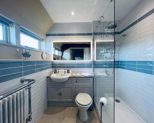 Ein Badezimmer in der Unterkunft Dingle Marsh Barns