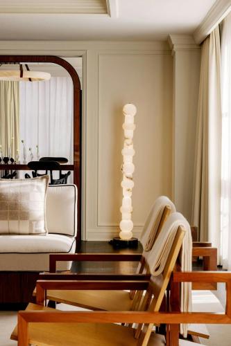 a living room with a coffee table and a couch at St. Regis Aspen Resort in Aspen