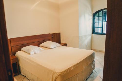 Katil atau katil-katil dalam bilik di Hotel Fazenda Ramon