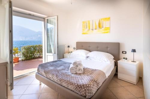 Ένα ή περισσότερα κρεβάτια σε δωμάτιο στο La Villetta Beths House