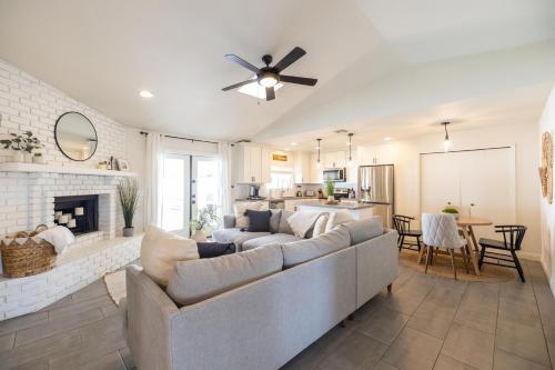 a living room with a couch and a fireplace at Gilbert East Laurel in Gilbert