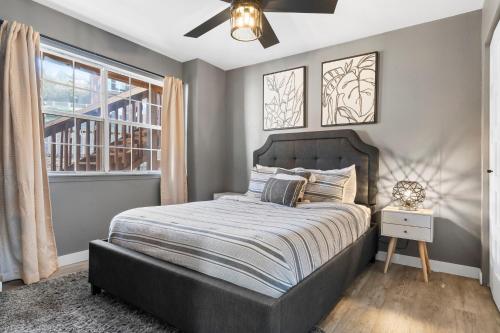 a bedroom with a bed and a window at Ozark Vista in Branson