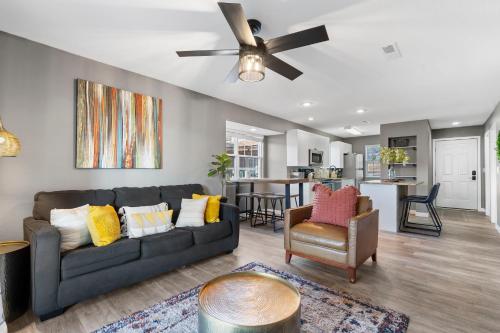 a living room with a couch and a table at Ozark Vista in Branson