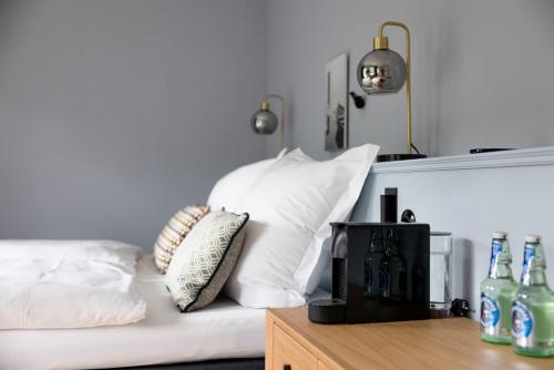 Postel nebo postele na pokoji v ubytování Boutiquehotel Petuh