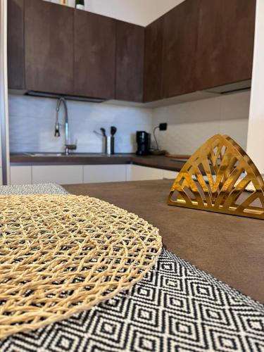 a kitchen counter with a rug on a table at Daniela Luxury Apartment in Rome
