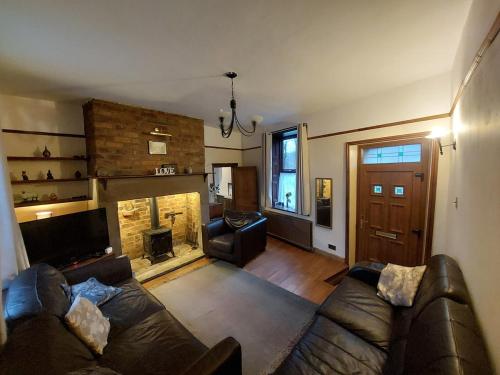 Χώρος καθιστικού στο Relax at the Cosy Snug Glossop