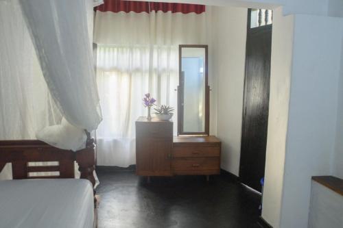 Cama o camas de una habitación en Sunshine Hotel