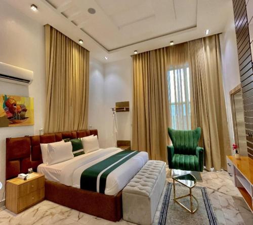 Postel nebo postele na pokoji v ubytování Lisa Suites Apart-Hotel