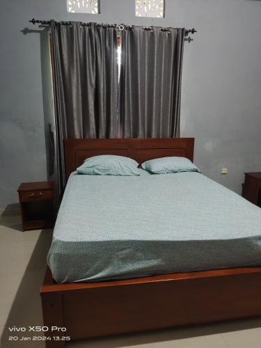 Ένα ή περισσότερα κρεβάτια σε δωμάτιο στο Private Villa Frangipani