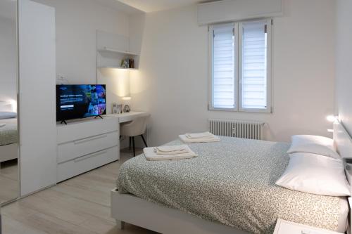 Postel nebo postele na pokoji v ubytování Casanuova Elegant Apartment & Breakfast